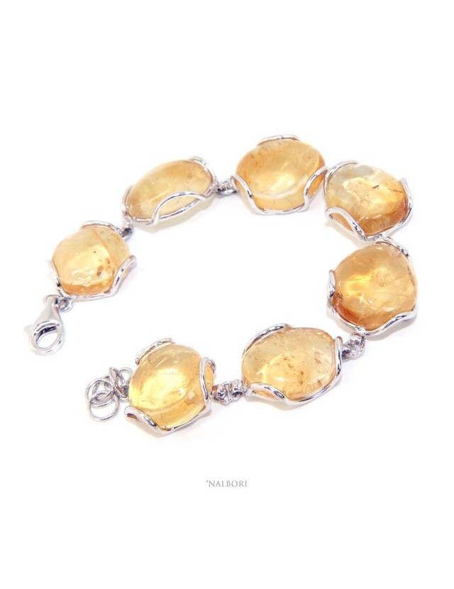 1000/5000
Woman bracelet in 925 silver and natural yellow citrine stones 30 gr